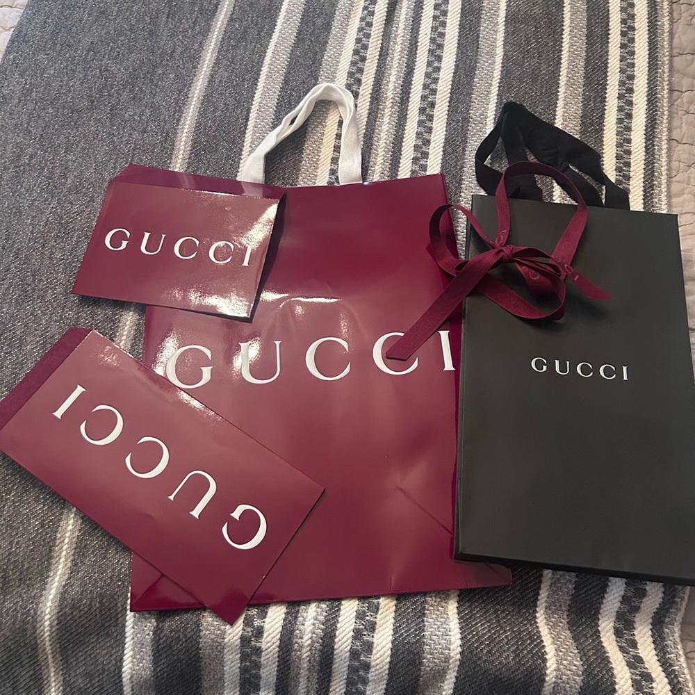 Authentic Gucci shopping bags & envelopes. beautiful Gucci packaging.Never used.